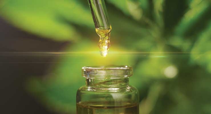 A shiny CBD oil being dropped into a bottle