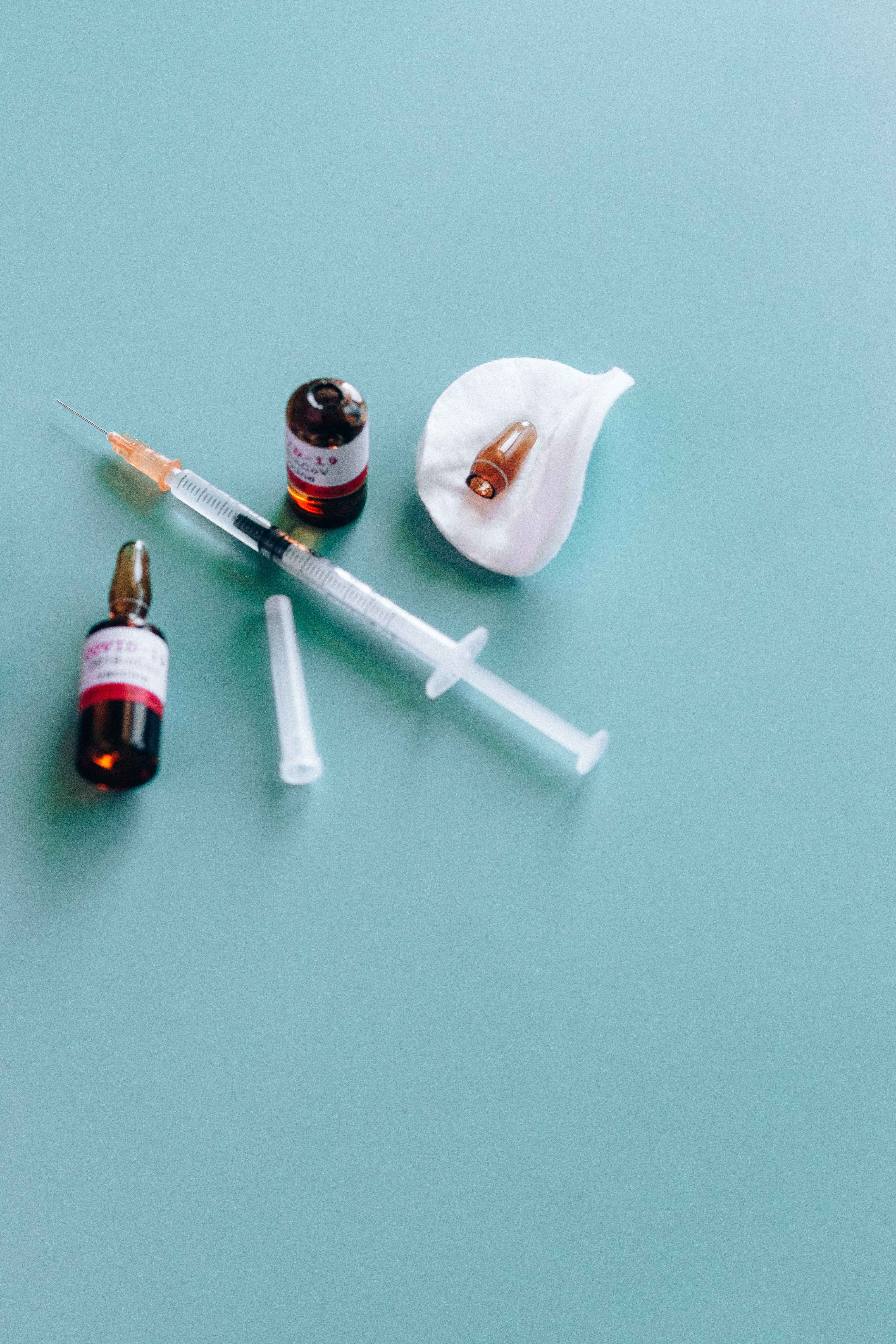 Covid-19 Vaccine vials and Syringe