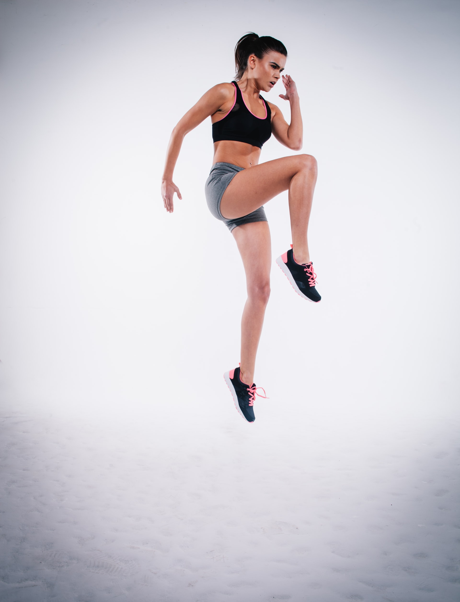 A woman jumping during workout