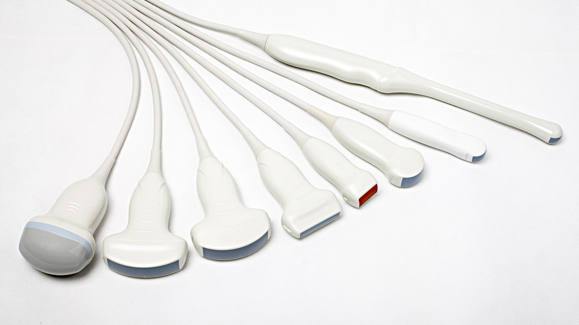 Different types and sizes of ultrasound transducers with their cords attached