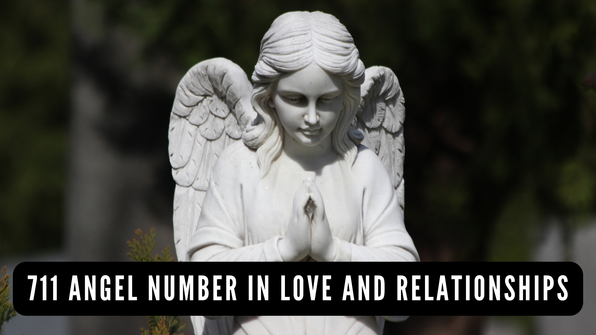 A praying angel statue with words 711 Angel Number In Love And Relationships